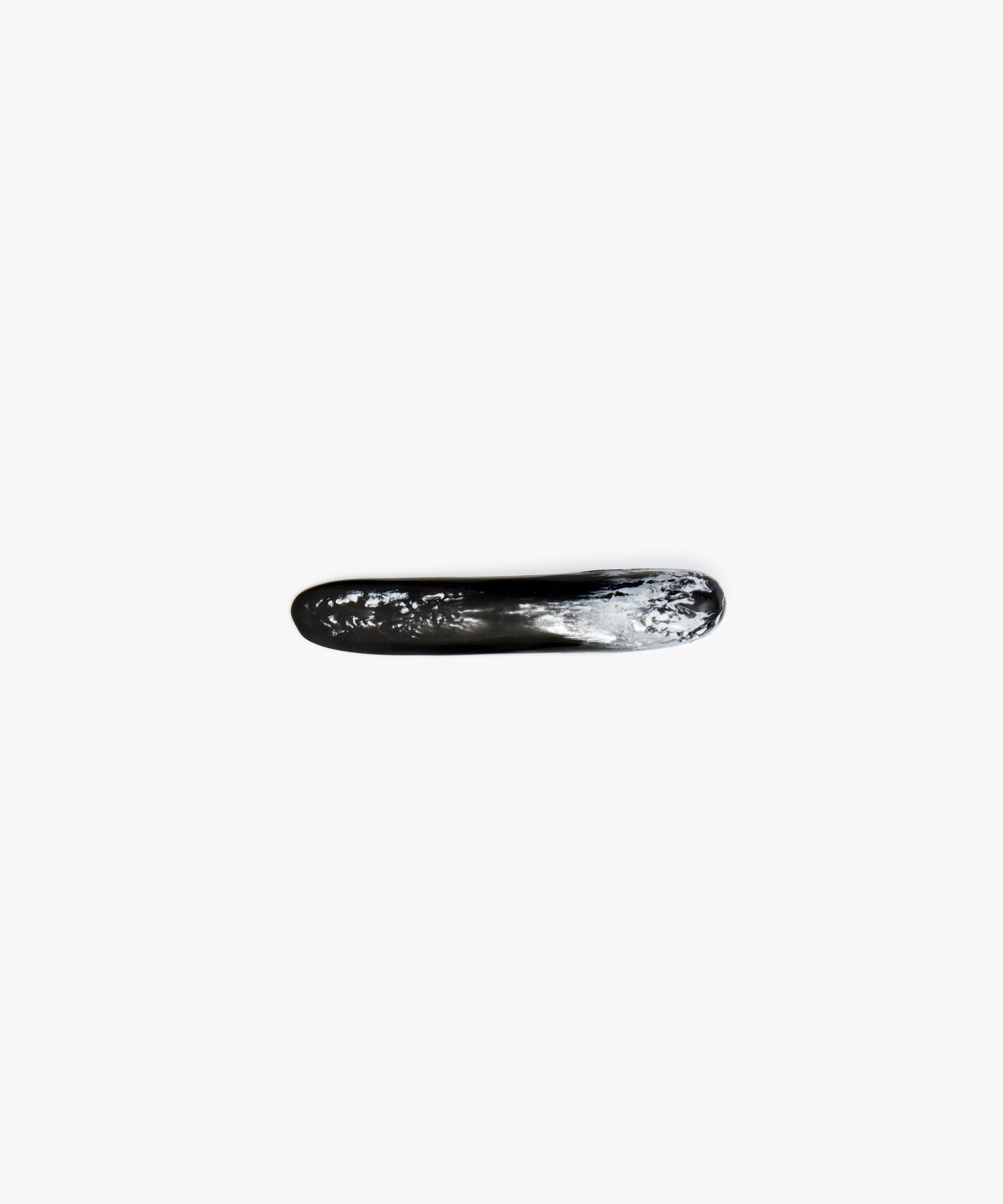 Dinosaur Designs Stone Butter Knife in Black Marble Colour resin