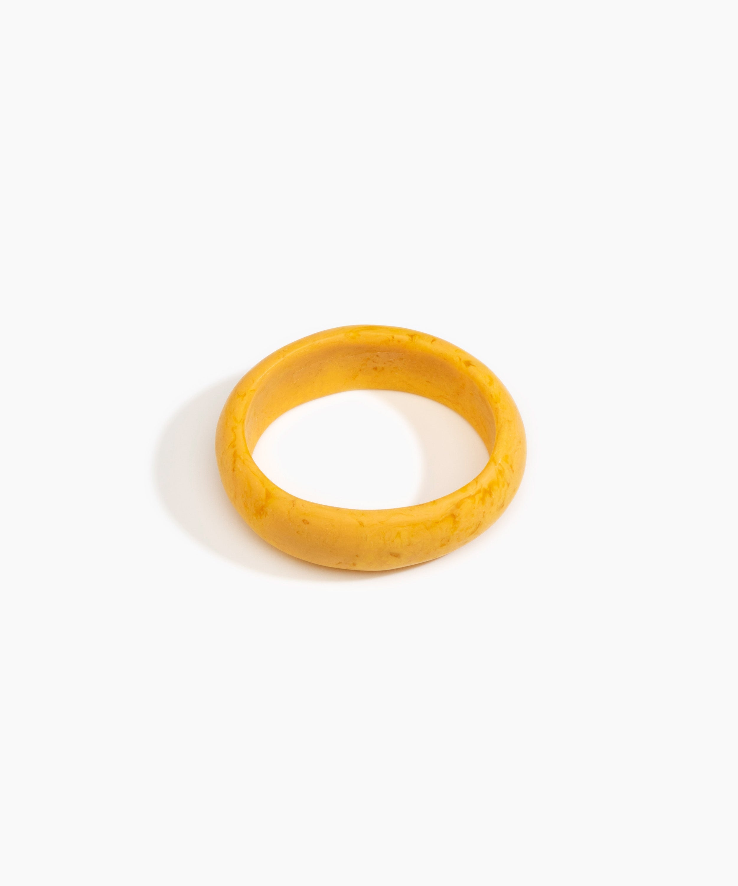 Dinosaur Designs Medium Organic Oval Bangle in Honeycomb Colour resin with Wide Fit