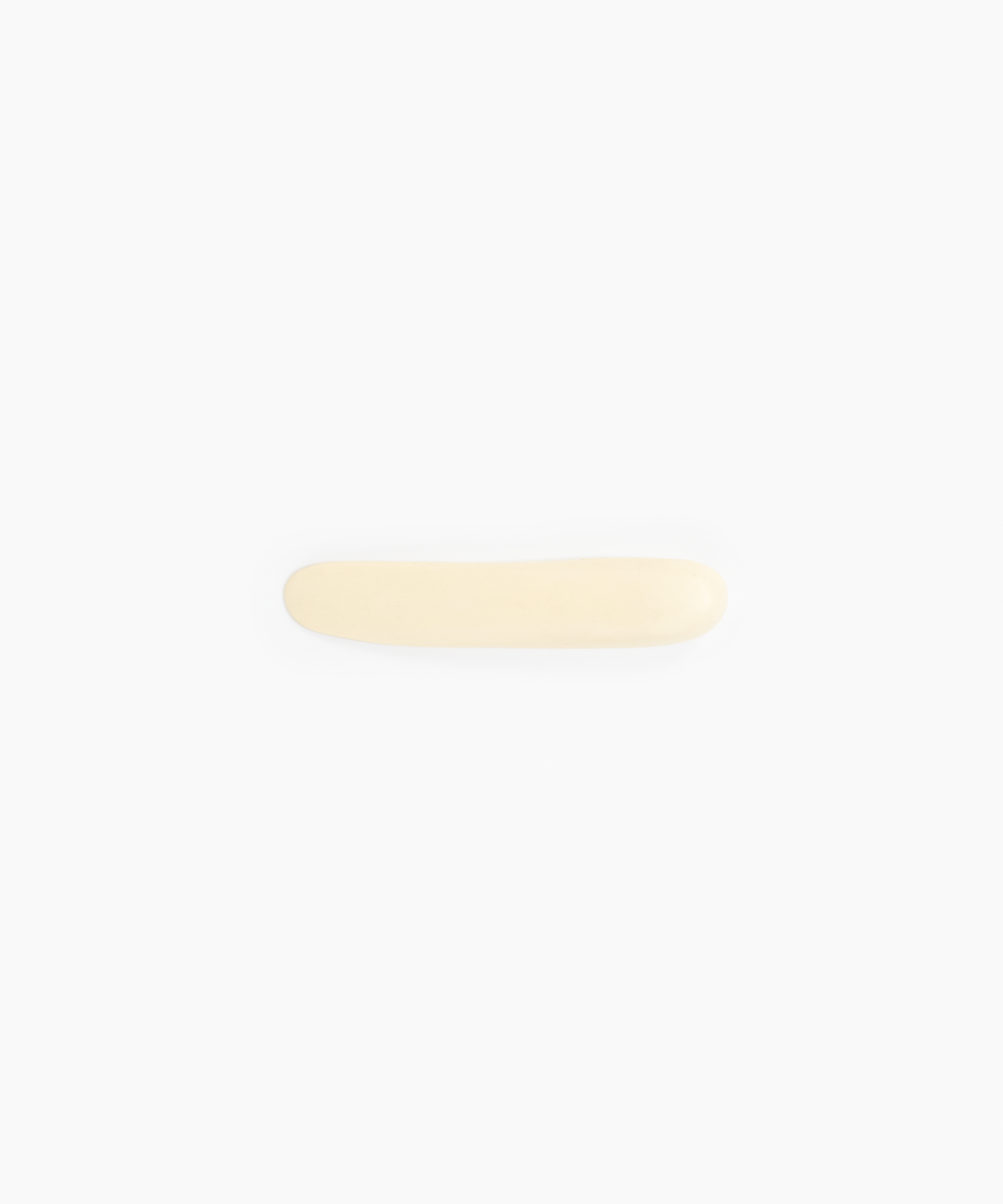 Dinosaur Designs Stone Butter Knife in Cream Colour resin