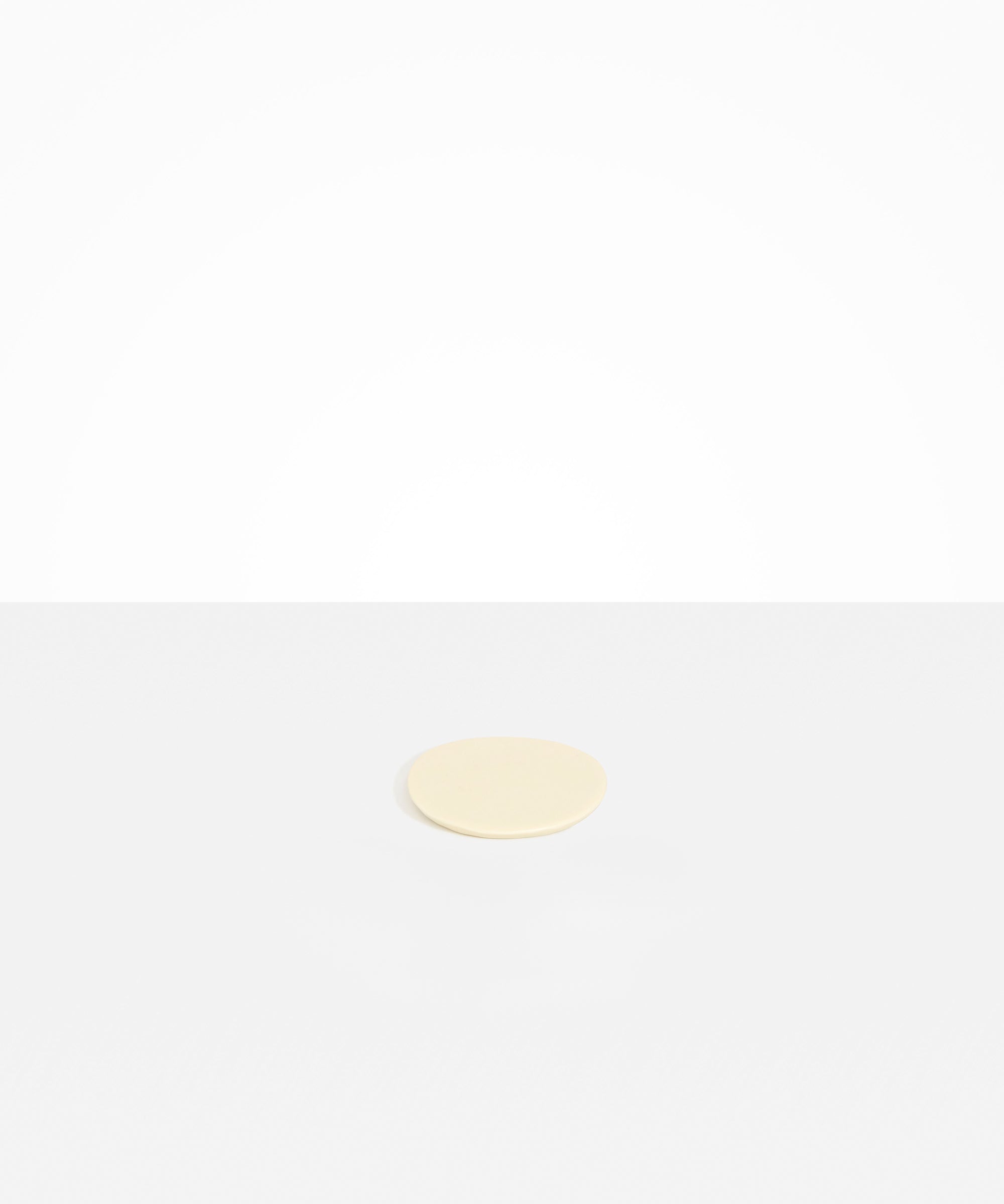 Dinosaur Designs Boulder Coaster in Cream Colour resin