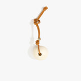 Dinosaur Designs Round Watercolour Bag Charm in Cream Colour resin with Brass Material