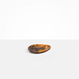Dinosaur Designs Pebble Side Plate in Dark Horn Colour resin