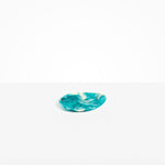 Dinosaur Designs Pebble Side Plate in Lagoon Colour resin