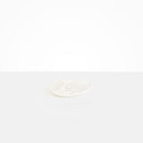 Dinosaur Designs Pebble Side Plate in Snow Swirl Colour resin