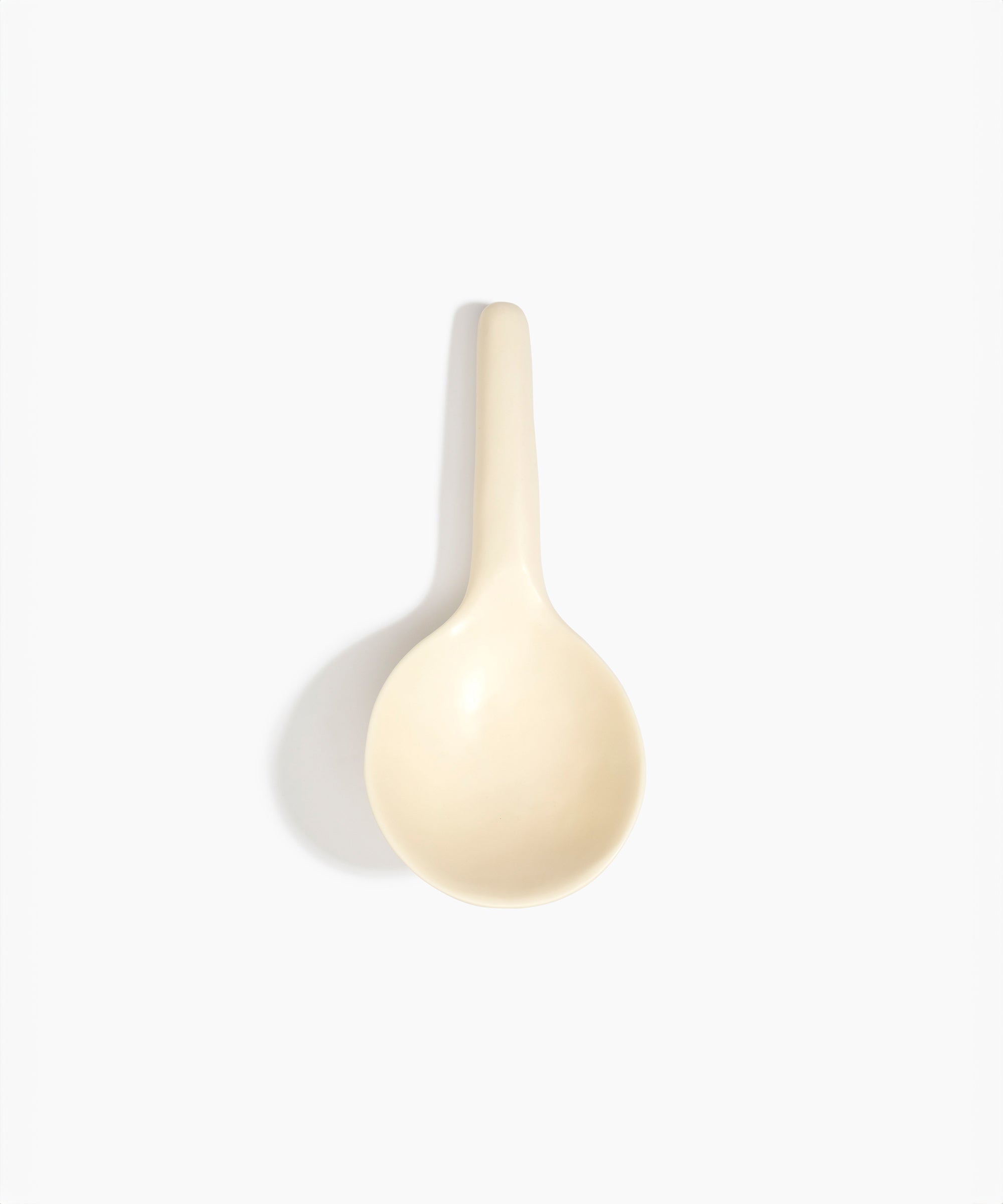 Dinosaur Designs Large Round Spoon in Cream Colour resin