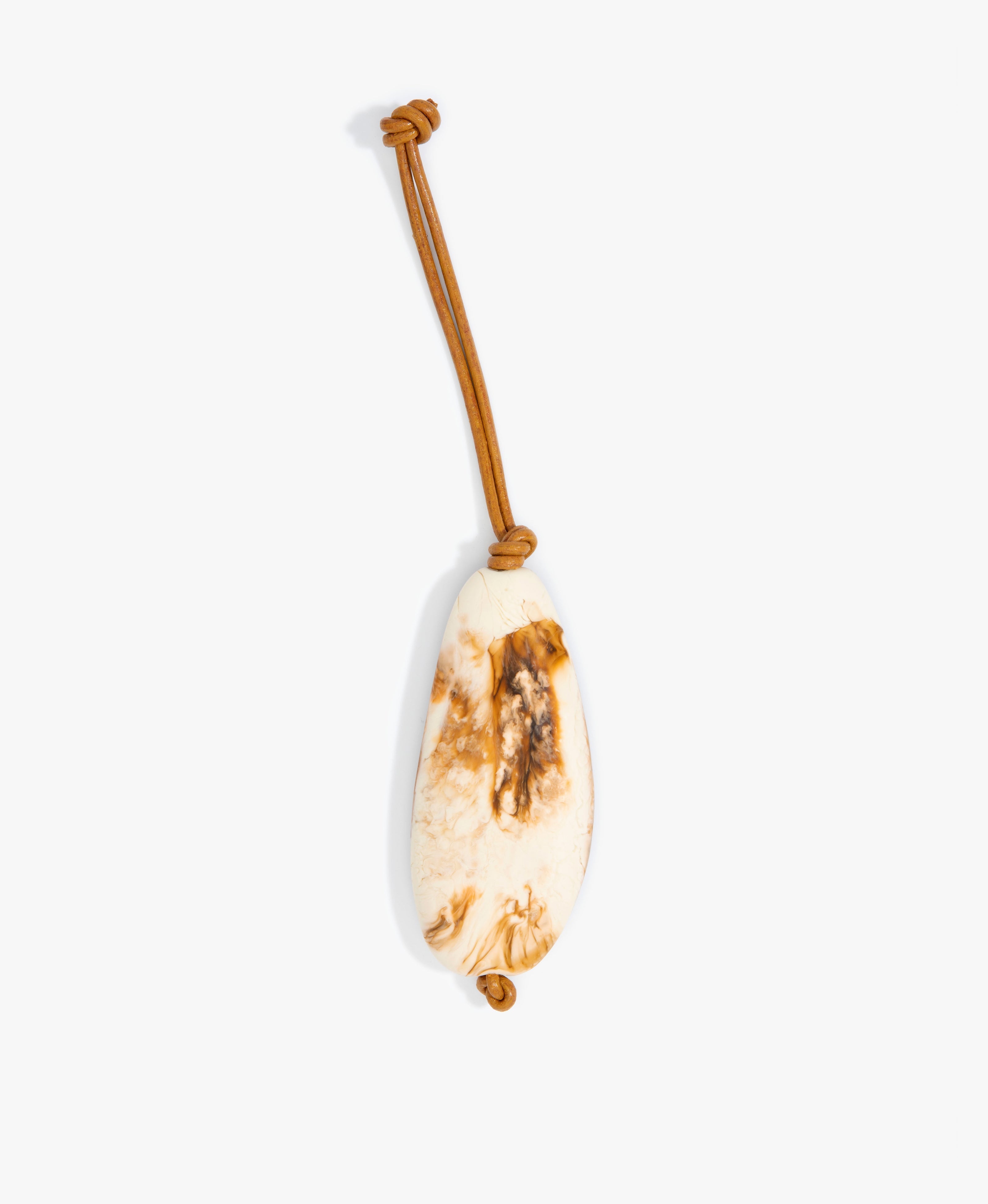 Dinosaur Designs Pebble Keyring Keychains in Light Horn Colour resin 