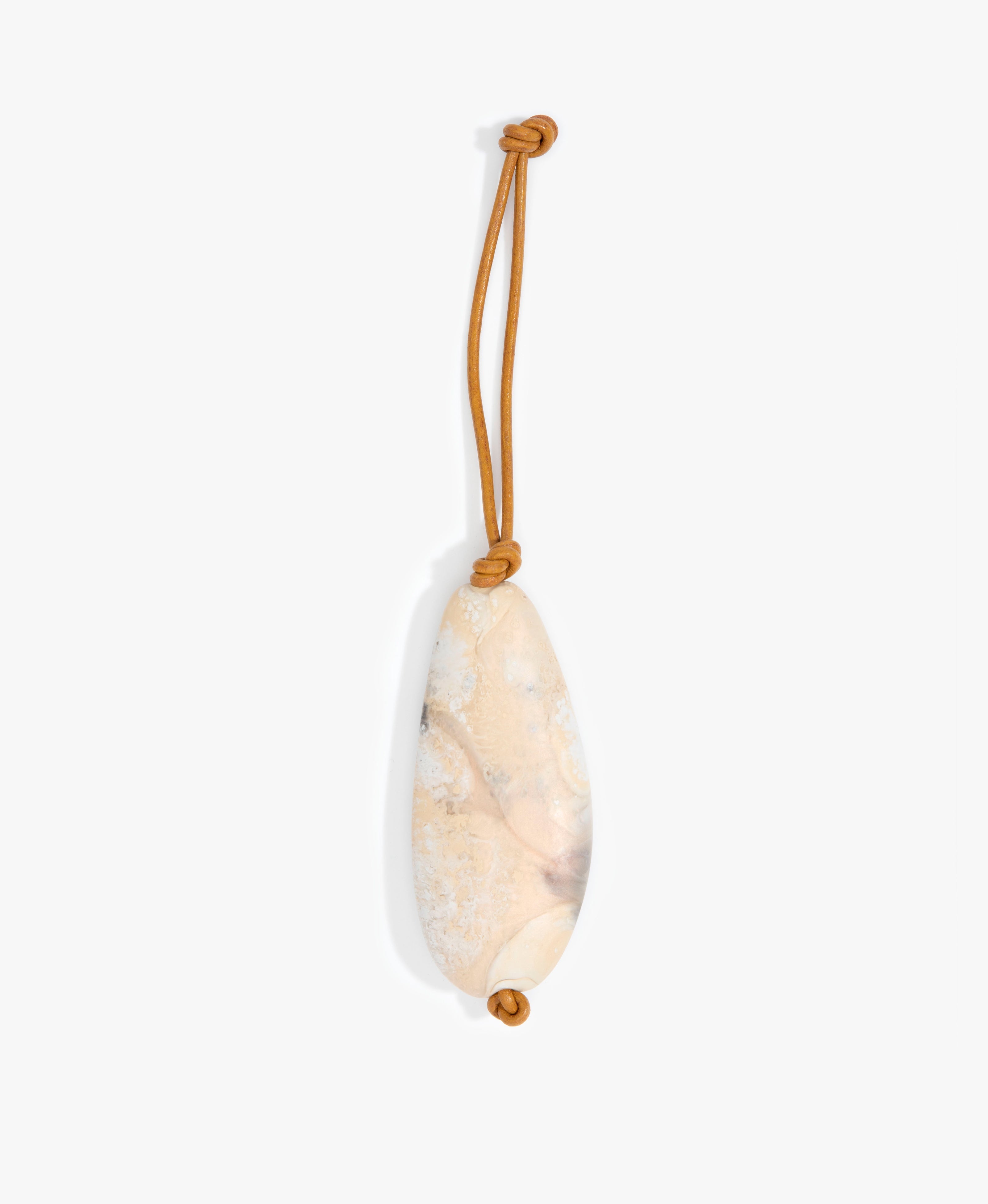 Dinosaur Designs Pebble Keyring Keychains in Sandy Pearl Colour resin 