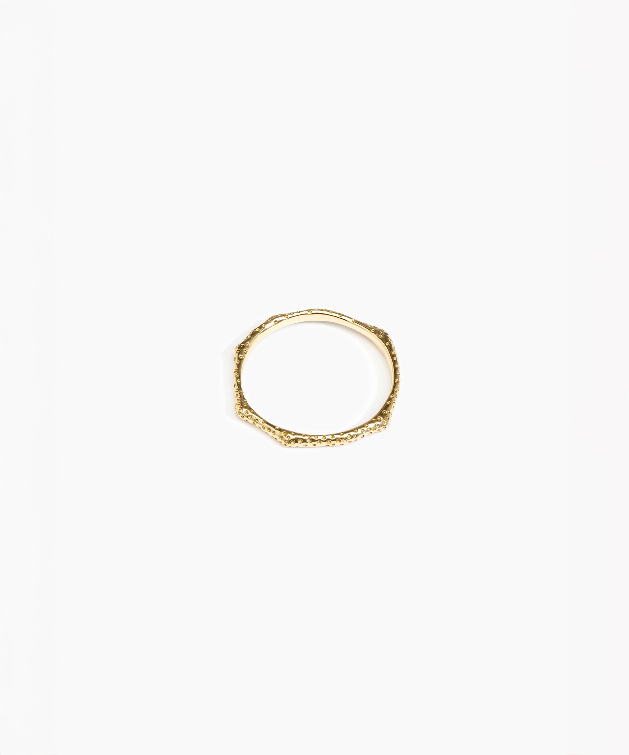 Dinosaur Designs Coral Bangle bracelet in brass with textured finish.