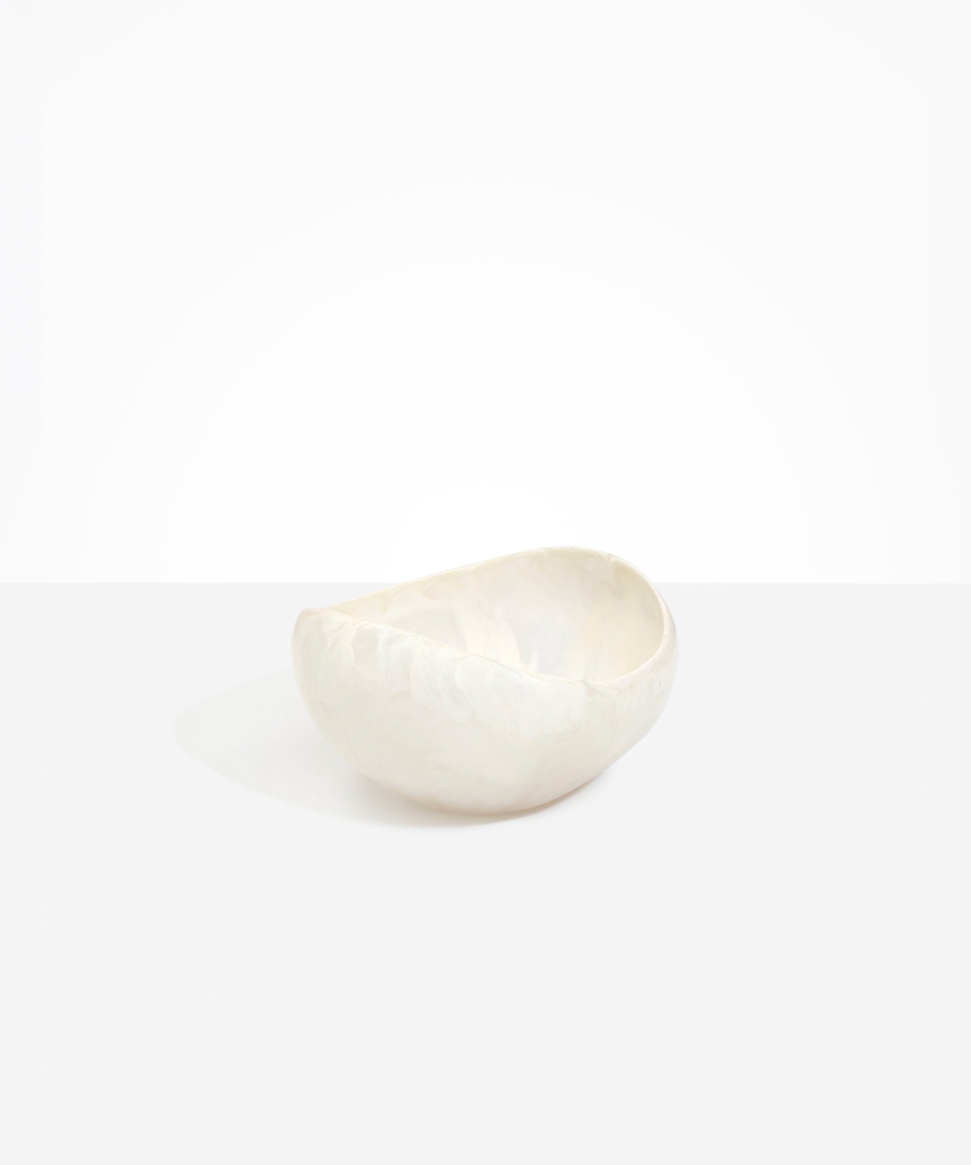 Dinosaur Designs Large Beetle Bowl in Chalk Swirl — handcrafted off-white resin bowl with rounded organic form and pinched open rim