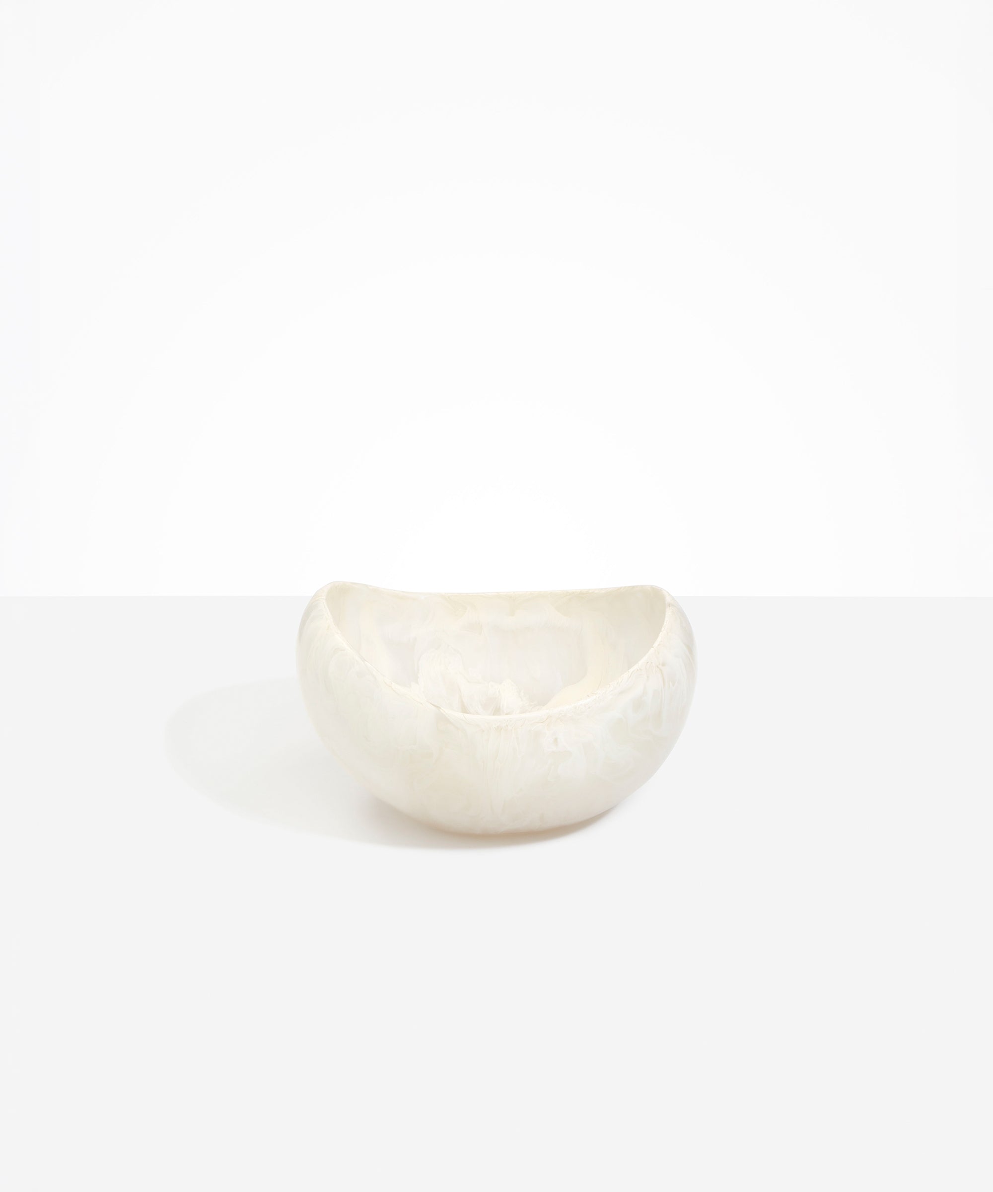 Dinosaur Designs Large Beetle Bowl in Chalk Swirl — handcrafted off-white resin bowl with rounded organic form and pinched open rim