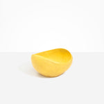 Dinosaur Designs Large Beetle Bowl in Pollen — handcrafted yellow resin bowl with rounded organic form and pinched open rim