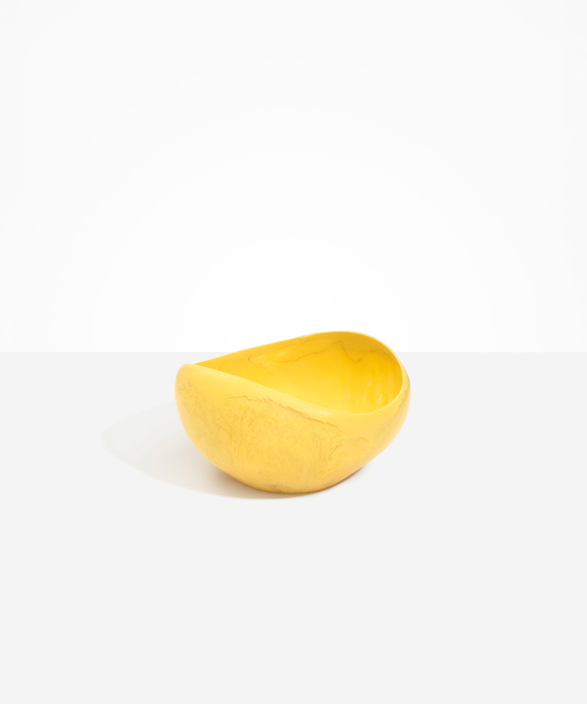 Dinosaur Designs Large Beetle Bowl in Pollen — handcrafted yellow resin bowl with rounded organic form and pinched open rim