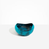 Dinosaur Designs Large Beetle Bowl in Turquoise — handcrafted teal blue resin bowl with rounded organic form and pinched open rim