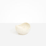 Dinosaur Designs Medium Beetle Bowl in Chalk Swirl — handcrafted off-white resin bowl with rounded organic form and pinched open rim