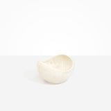 Dinosaur Designs Medium Beetle Bowl in Chalk Swirl — handcrafted off-white resin bowl with rounded organic form and pinched open rim