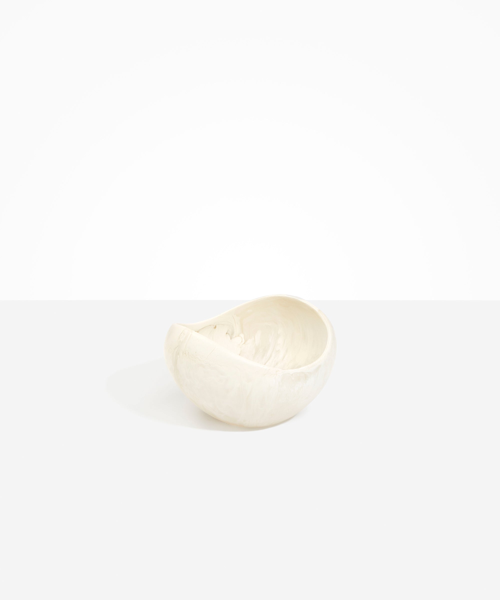 Dinosaur Designs Medium Beetle Bowl in Chalk Swirl — handcrafted off-white resin bowl with rounded organic form and pinched open rim