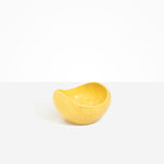 Dinosaur Designs Medium Beetle Bowl in Pollen — handcrafted yellow resin bowl with rounded organic form and pinched open rim