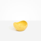 Dinosaur Designs Medium Beetle Bowl in Pollen — handcrafted yellow resin bowl with rounded organic form and pinched open rim