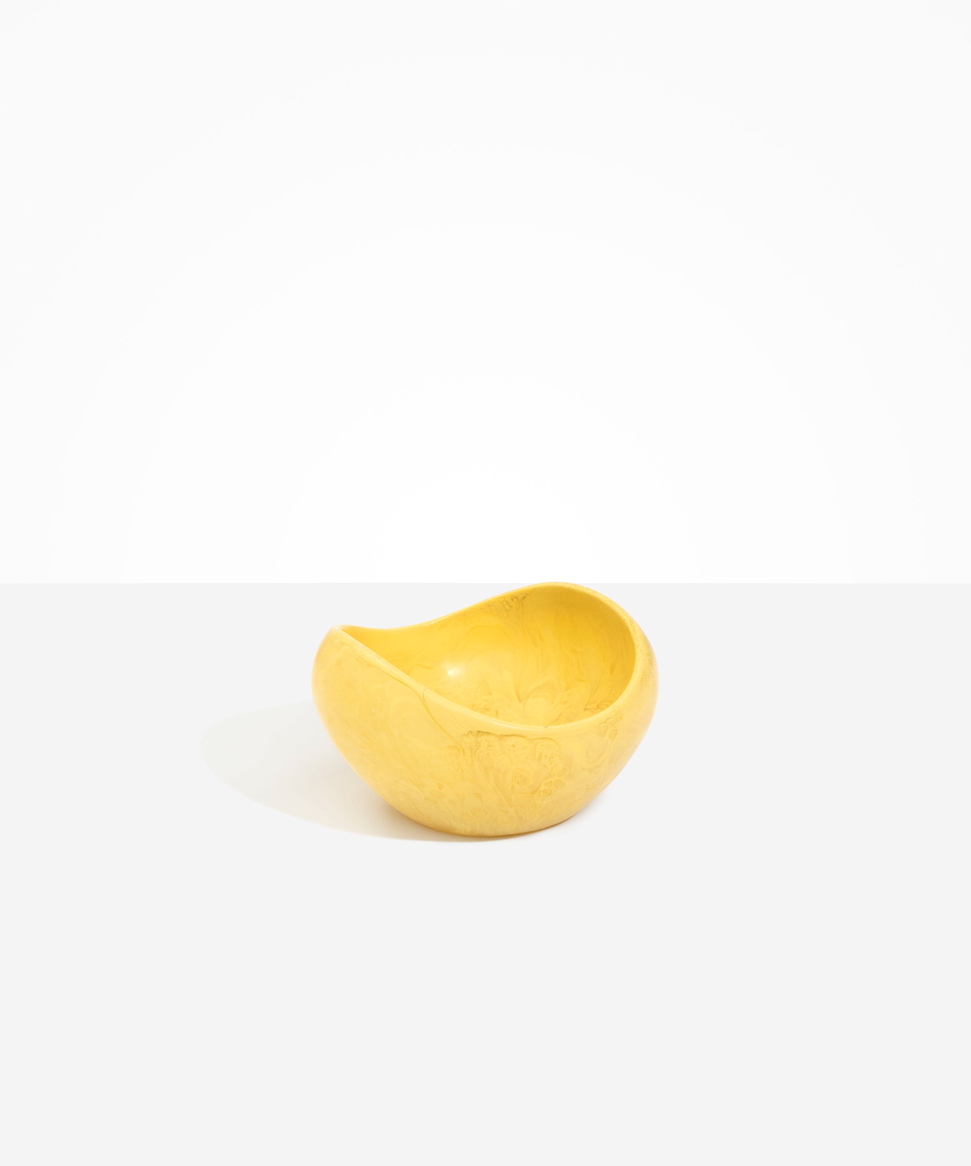 Dinosaur Designs Medium Beetle Bowl in Pollen — handcrafted yellow resin bowl with rounded organic form and pinched open rim