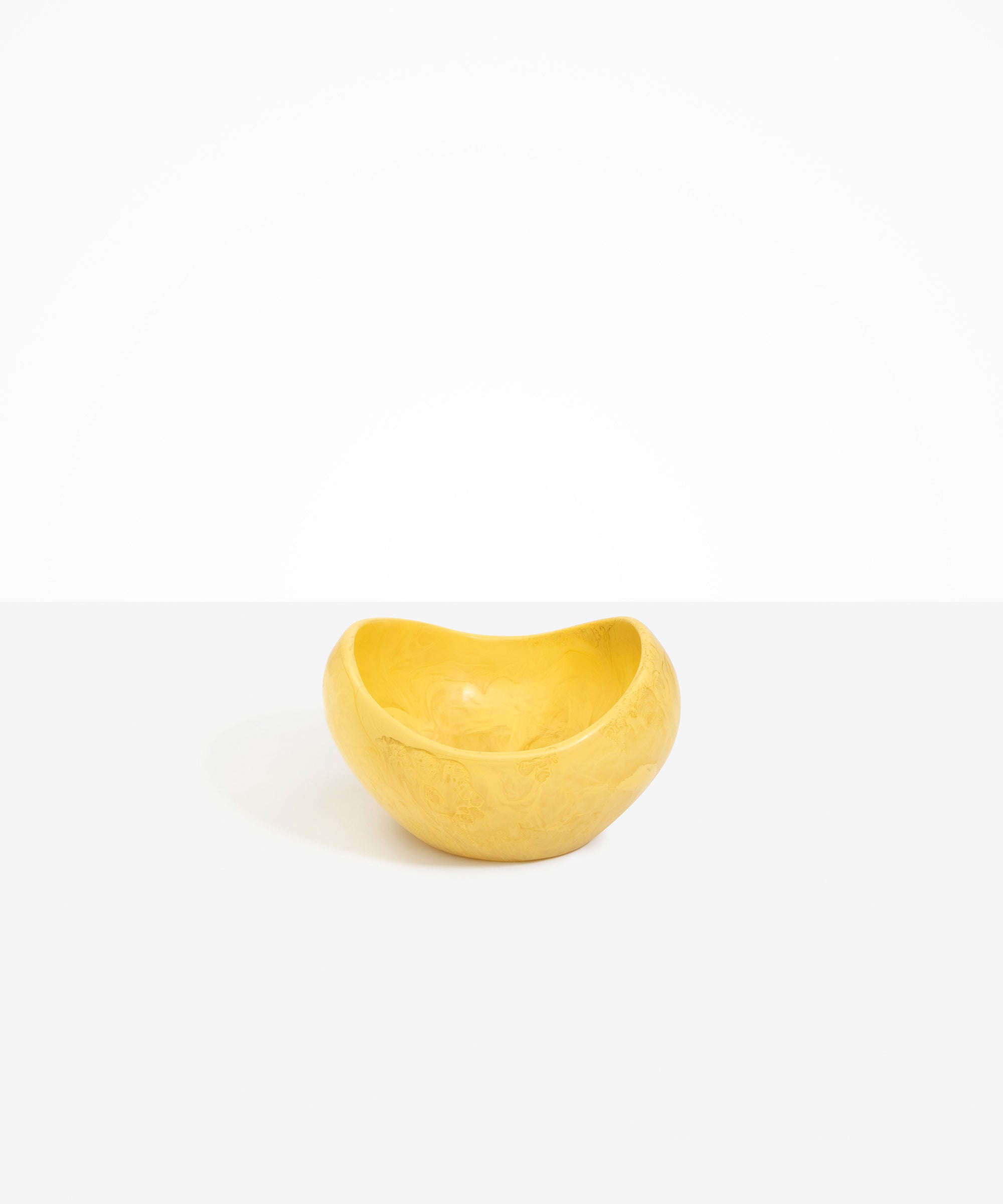 Dinosaur Designs Medium Beetle Bowl in Pollen — handcrafted yellow resin bowl with rounded organic form and pinched open rim