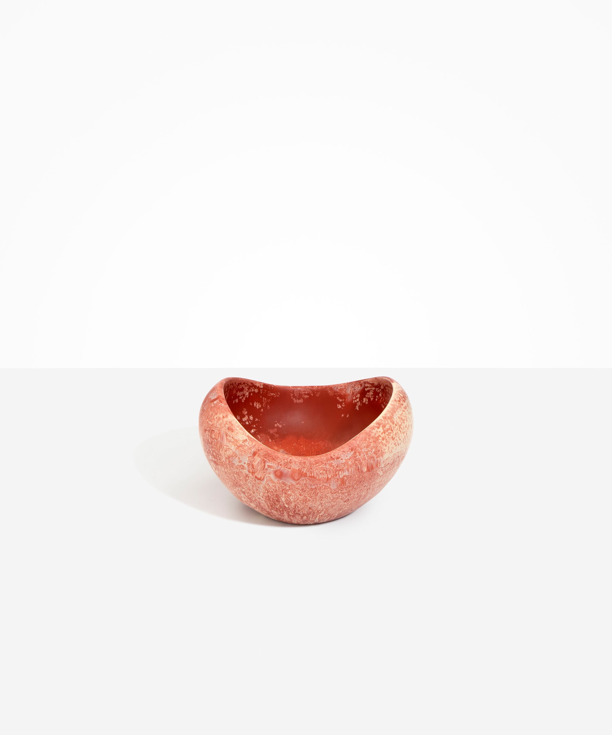 Dinosaur Designs Medium Beetle Bowl in Rust — handcrafted terracotta red and cream resin bowl with rounded organic form and pinched open rim