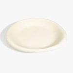 Dinosaur Designs Large Bones Bowl in Cream — handmade cream resin shallow serving bowl with a rounded organic form..