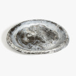 Dinosaur Designs Large Bones Bowl in Granite — handmade marbled cream and grey resin shallow serving bowl with a rounded organic form..