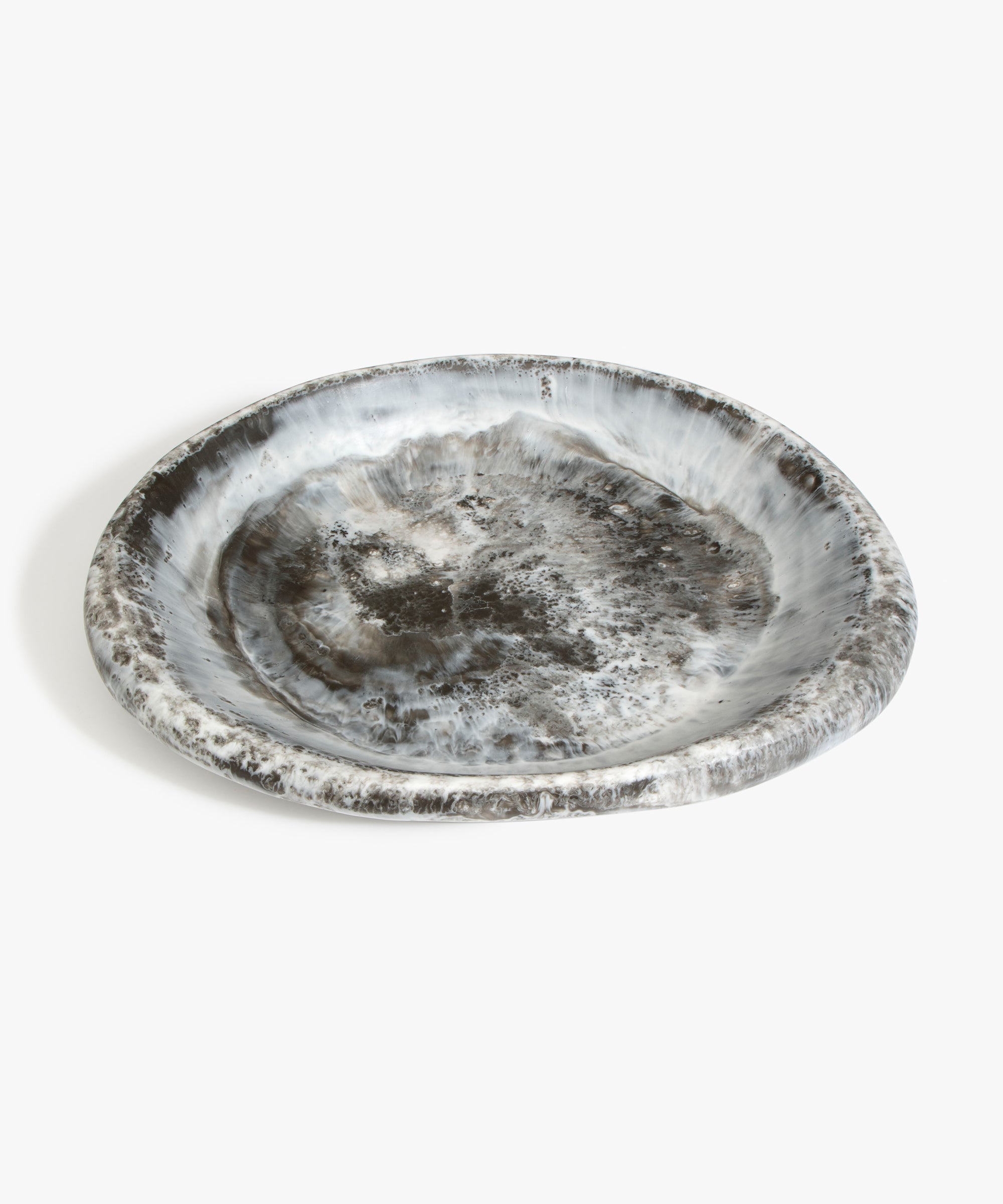 Dinosaur Designs Large Bones Bowl in Granite — handmade marbled cream and grey resin shallow serving bowl with a rounded organic form..