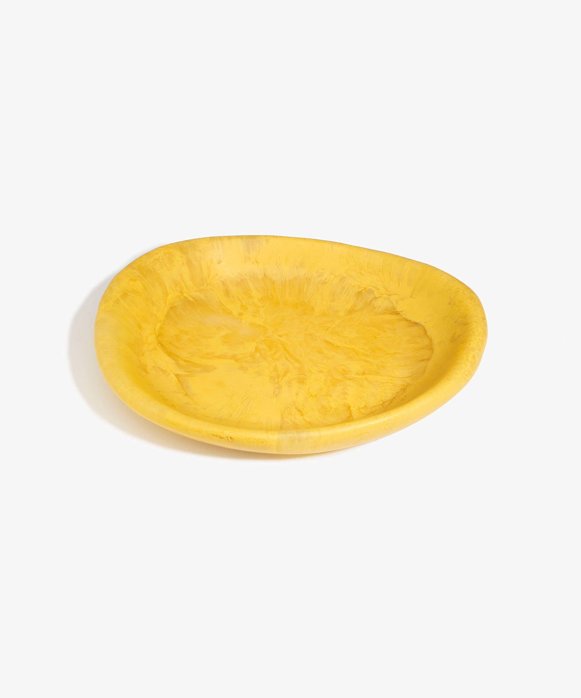 Dinosaur Designs Large Bones Bowl in Pollen — handmade marbled yellow resin shallow serving bowl with a rounded organic form