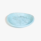 Dinosaur Designs Large Bones Bowl in Pool — handmade marbled blue resin shallow serving bowl with a rounded organic form..