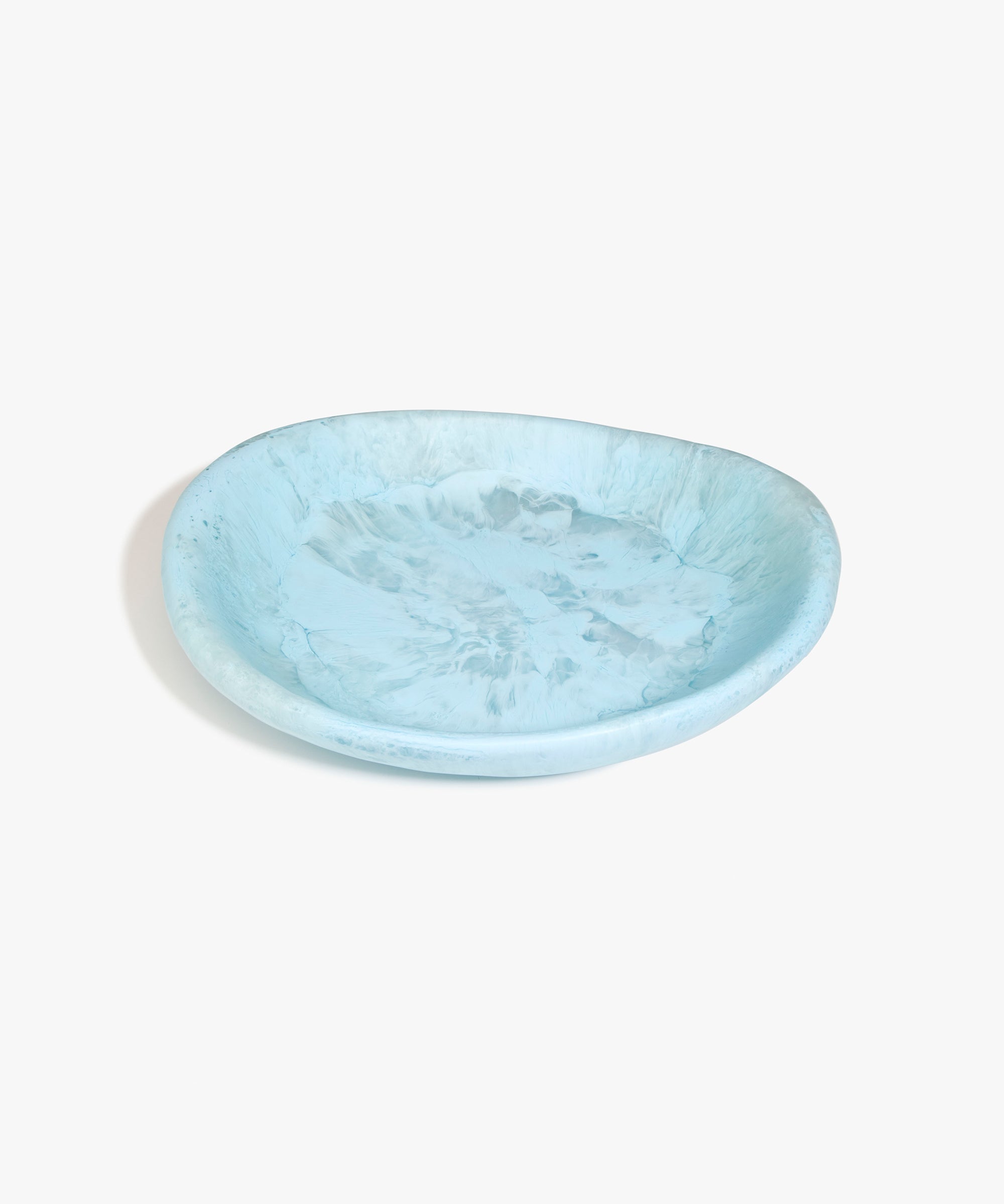 Dinosaur Designs Large Bones Bowl in Pool — handmade marbled blue resin shallow serving bowl with a rounded organic form..