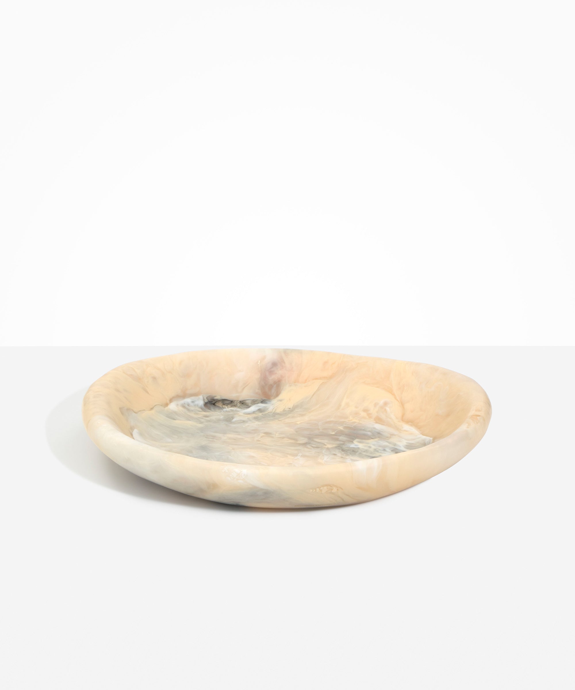 Dinosaur Designs Large Bones Bowl in Sandy Pearl —  handmade marbled beige, grey and pearlescent resin shallow serving bowl with a rounded organic form