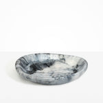 Dinosaur Designs Large Bones Bowl in Slate — handmade marbled black, grey and silver resin shallow serving bowl with a rounded organic form..