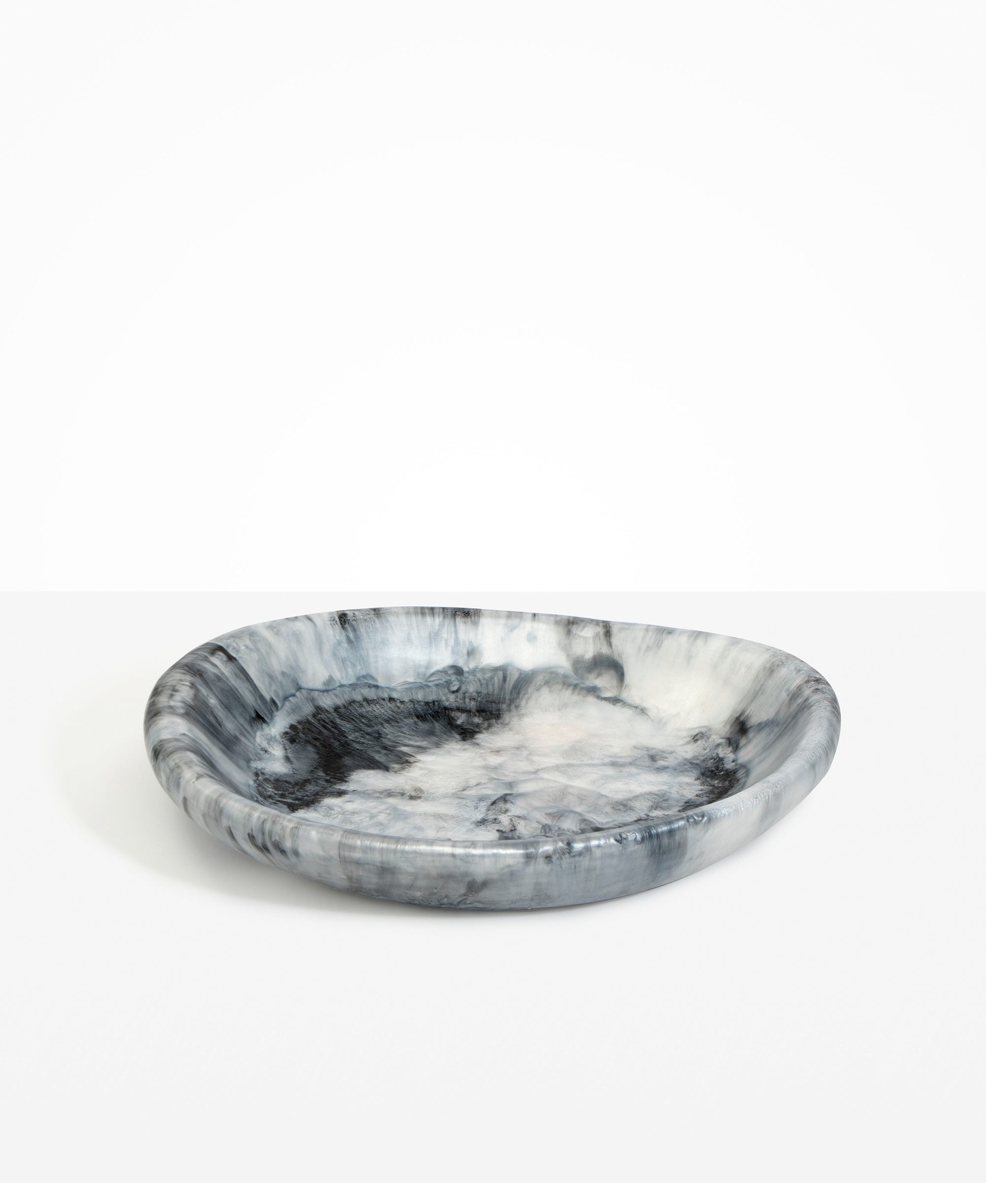 Dinosaur Designs Large Bones Bowl in Slate — handmade marbled black, grey and silver resin shallow serving bowl with a rounded organic form..