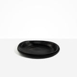 Dinosaur Designs Medium Bones Bowl in Black — mid sized handmade black resin shallow serving bowl with a rounded organic form