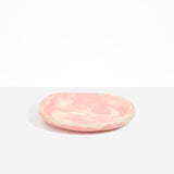 Dinosaur Designs Medium Bones Bowl in Blossom — mid sized handmade marbled pink and cream resin shallow serving bowl with a rounded organic form