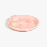 Dinosaur Designs Medium Bones Bowl in Blossom — mid sized handmade marbled pink and cream resin shallow serving bowl with a rounded organic form