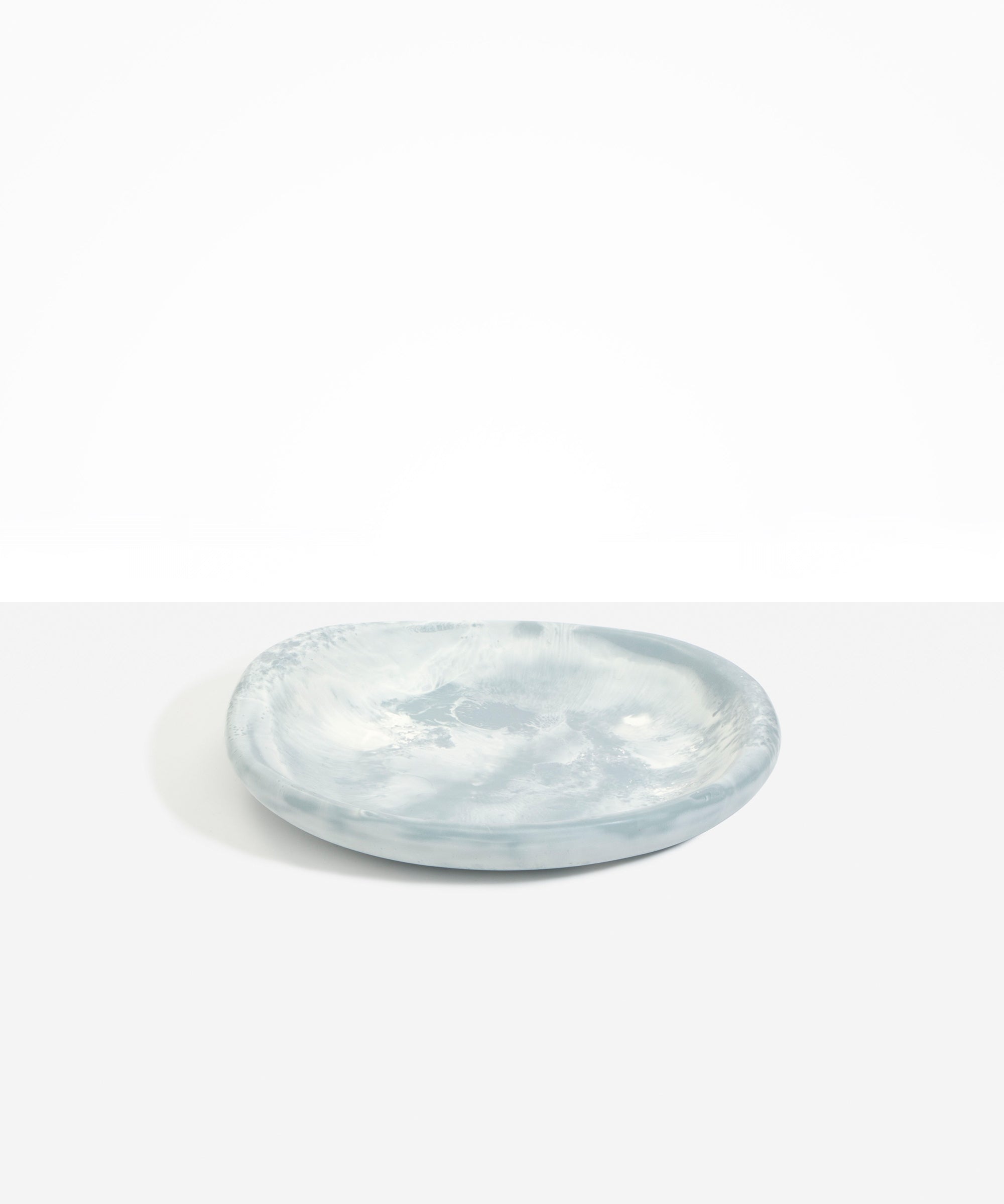 Dinosaur Designs Medium Bones Bowl in Cloud — mid sized handmade marbled cream and grey resin shallow serving bowl with a rounded organic form