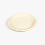Dinosaur Designs Medium Bones Bowl in Cream — mid sized handmade cream resin shallow serving bowl with a rounded organic form