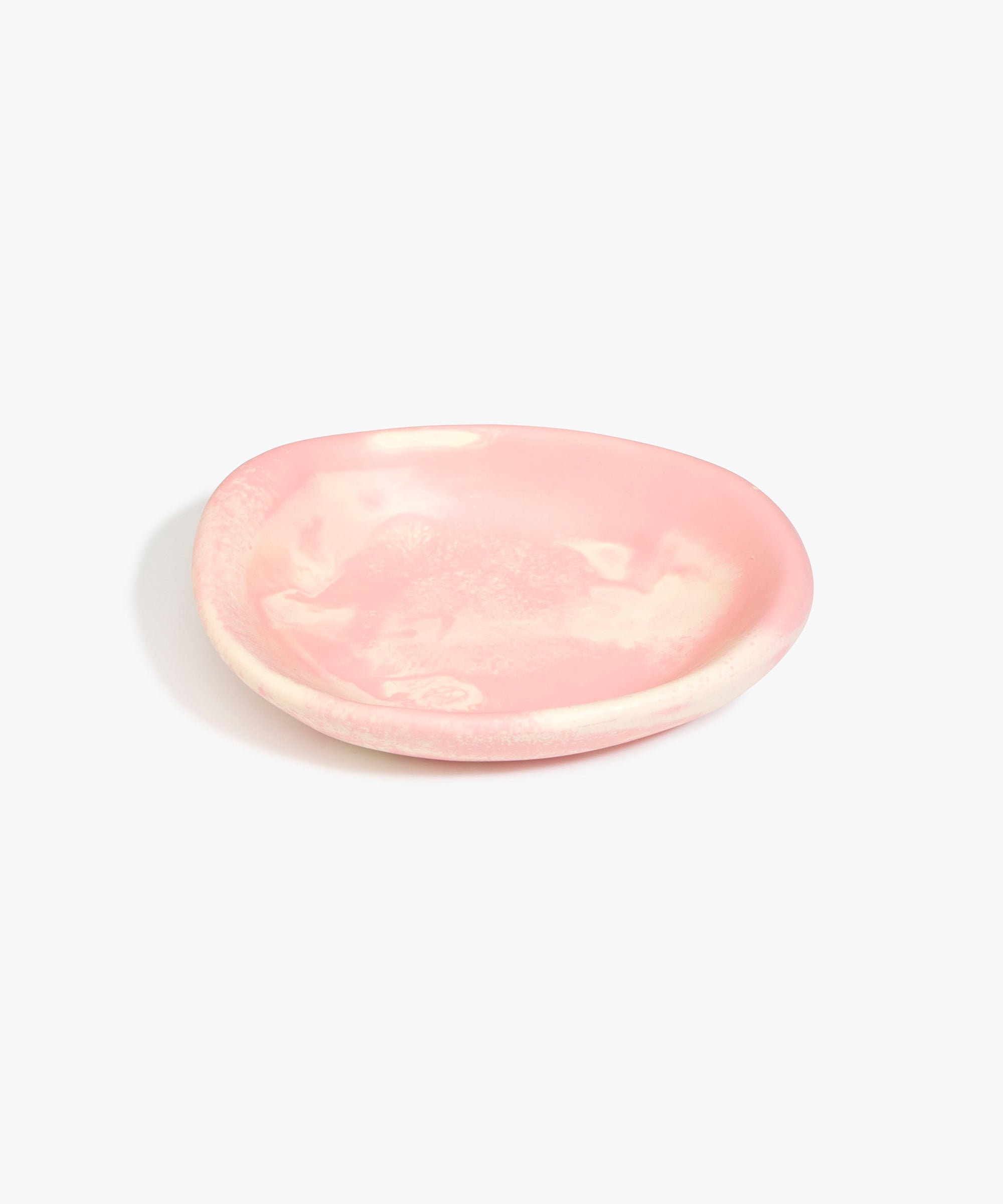 Dinosaur Designs Small Bones Bowl in Blossom — small handmade marbled pink and cream resin shallow serving bowl with a rounded organic form