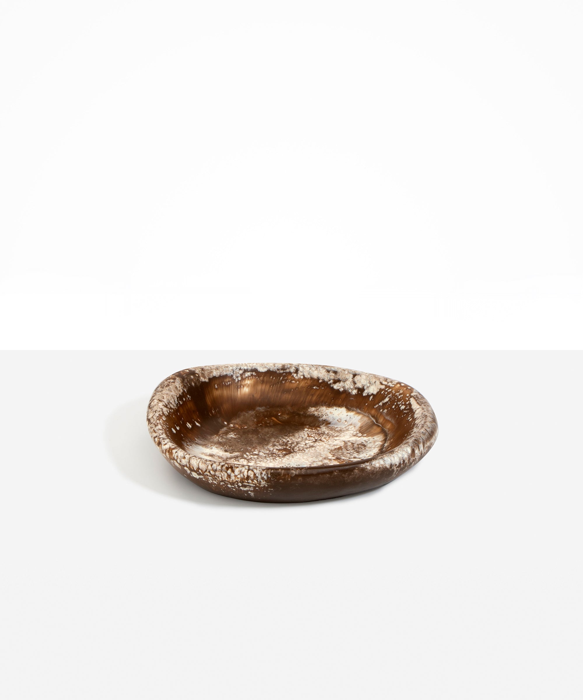 Dinosaur Designs Small Bones Bowl in Cappuccino — small handmade marbled brown and cream resin shallow serving bowl with a rounded organic form