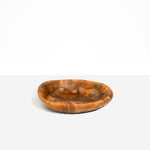 Dinosaur Designs Small Bones Bowl in Dark Horn — small handmade marbled brown, black and pearlescent gold resin shallow serving bowl with a rounded organic form