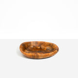 Dinosaur Designs Small Bones Bowl in Dark Horn — small handmade marbled brown, black and pearlescent gold resin shallow serving bowl with a rounded organic form