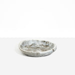 Dinosaur Designs Small Bones Bowl in  Granite — small handmade marbled grey and cream resin shallow serving bowl with a rounded organic form