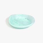 Dinosaur Designs Small Bones Bowl in Mint — small handmade marbled green blue resin shallow serving bowl with a rounded organic form