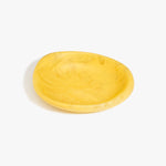 Dinosaur Designs Small Bones Bowl in Pollen — small handmade marbled yellow resin shallow serving bowl with a rounded organic form