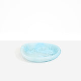 Dinosaur Designs Small Bones Bowl in Pool — small handmade marbled blue resin shallow serving bowl with a rounded organic form