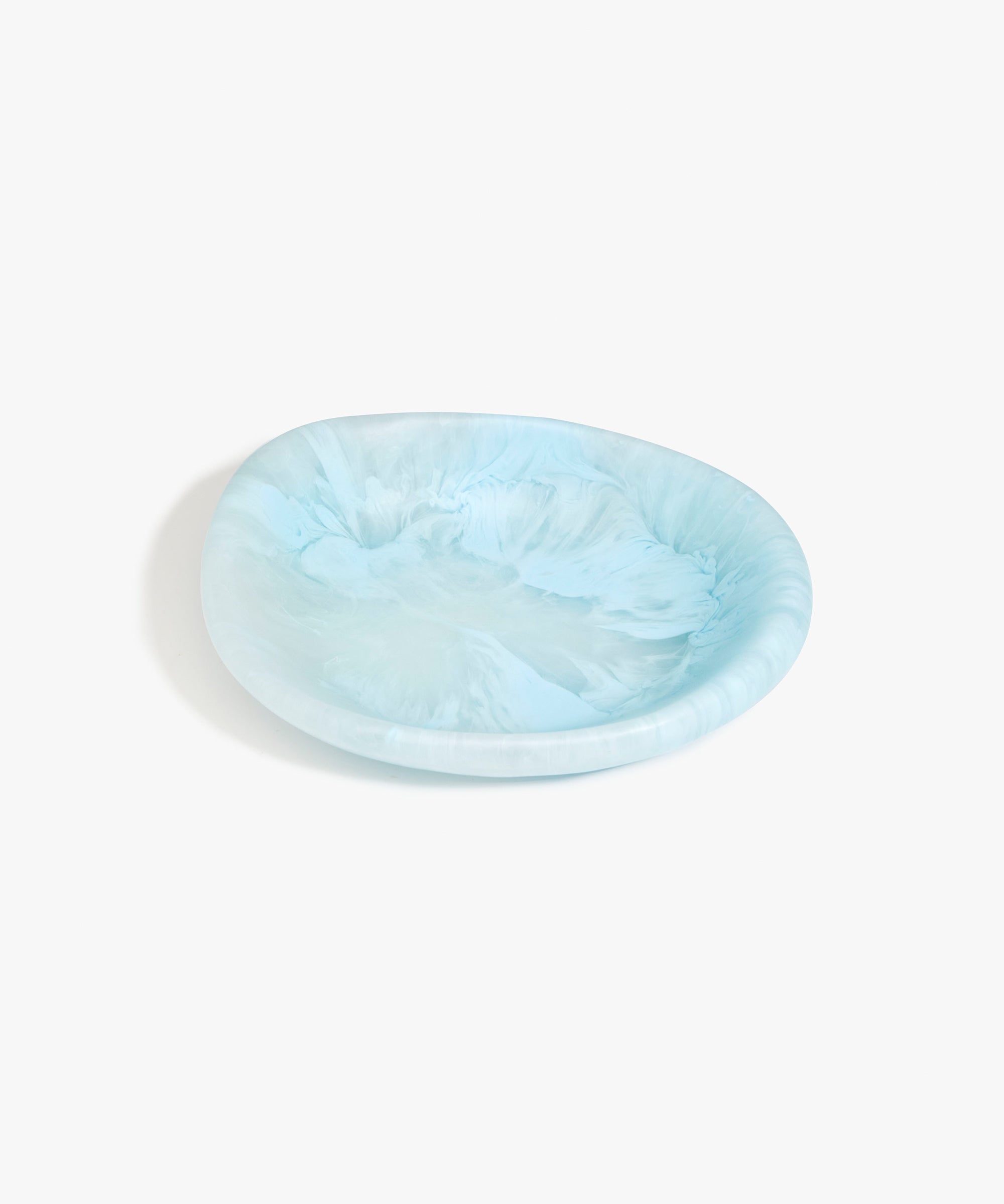 Dinosaur Designs Small Bones Bowl in Pool — small handmade marbled blue resin shallow serving bowl with a rounded organic form