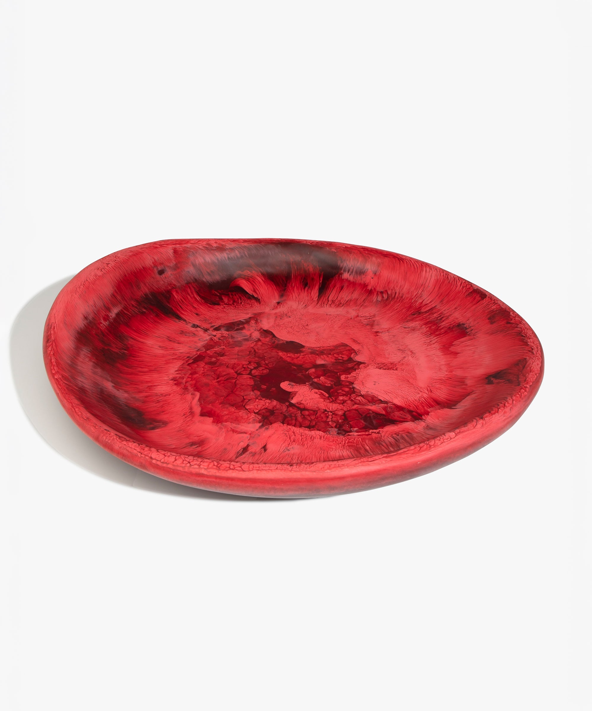 Dinosaur Designs Extra Large Bones Bowl in Cranberry —  handmade marbled red resin shallow decorative bowl with a rounded organic form