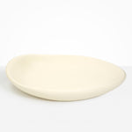 Dinosaur Designs Extra Large Bones Bowl in Cream —  handmade cream resin shallow decorative bowl with a rounded organic form
